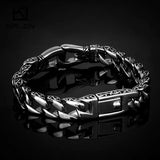 Bracelet ROCKSAN SLIM en acier inoxydable finement gravé de motifs aztèques. Élégance discrète, style antique revisité pour un look masculin affirmé
