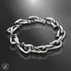 bracelet clou acier, bracelet homme industriel, bijou design moderne, bracelet chaîne clou, bijou masculin acier inoxydable