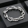 bracelet clou acier, bracelet homme industriel, bijou design moderne, bracelet chaîne clou, bijou masculin acier inoxydable