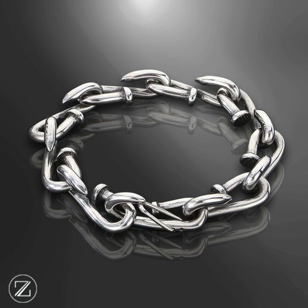 bracelet clou acier, bracelet homme industriel, bijou design moderne, bracelet chaîne clou, bijou masculin acier inoxydable