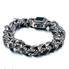

bracelet homme acier motif gravé, bracelet baroque, bracelet vintage acier argent vieilli, bracelet homme pierre noire, bracelet tribal moderne, bijou masculin fleur de lys, bracelet fort style médiéval
