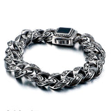 

bracelet homme acier motif gravé, bracelet baroque, bracelet vintage acier argent vieilli, bracelet homme pierre noire, bracelet tribal moderne, bijou masculin fleur de lys, bracelet fort style médiéval